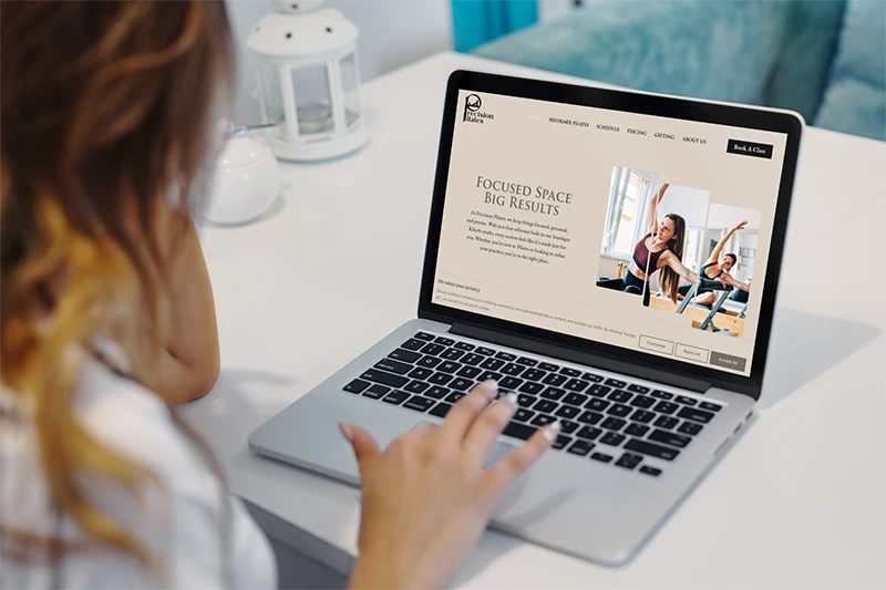 Precision Pilates website shown on devices