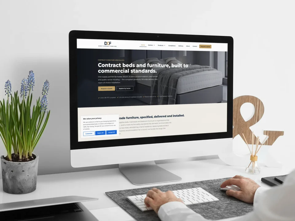 Direct Contract Furniture website on an iMac